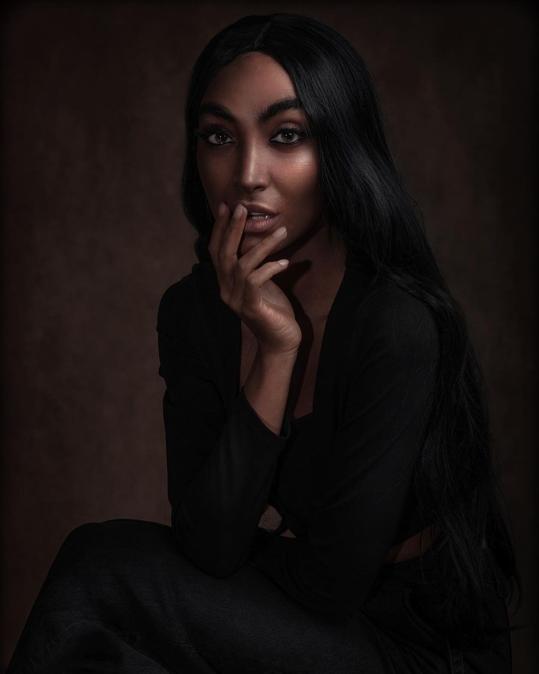 Fine art portrait of a woman in cinematic light