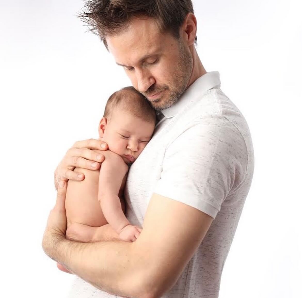 Newborn photo with dad