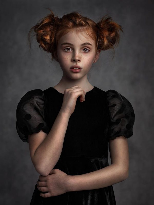 Black and white fine art portrait in studio lighting